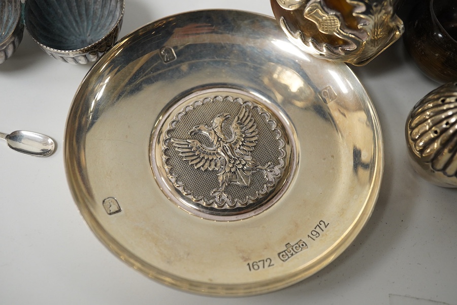 A 19th century white metal mounted horn snuff mull(split), 72mm, a small late Victorian silver cruet stand, a silver topped glass jar, a silver dish, small silver spoon and a white metal pill box. Condition - poor to fai